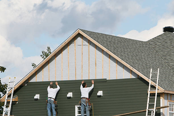 Professional Vinyl Siding technician working in Spring Valley, OH